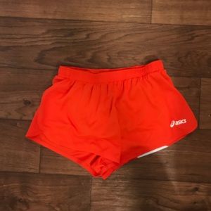 Orange ASIC shorts with liners